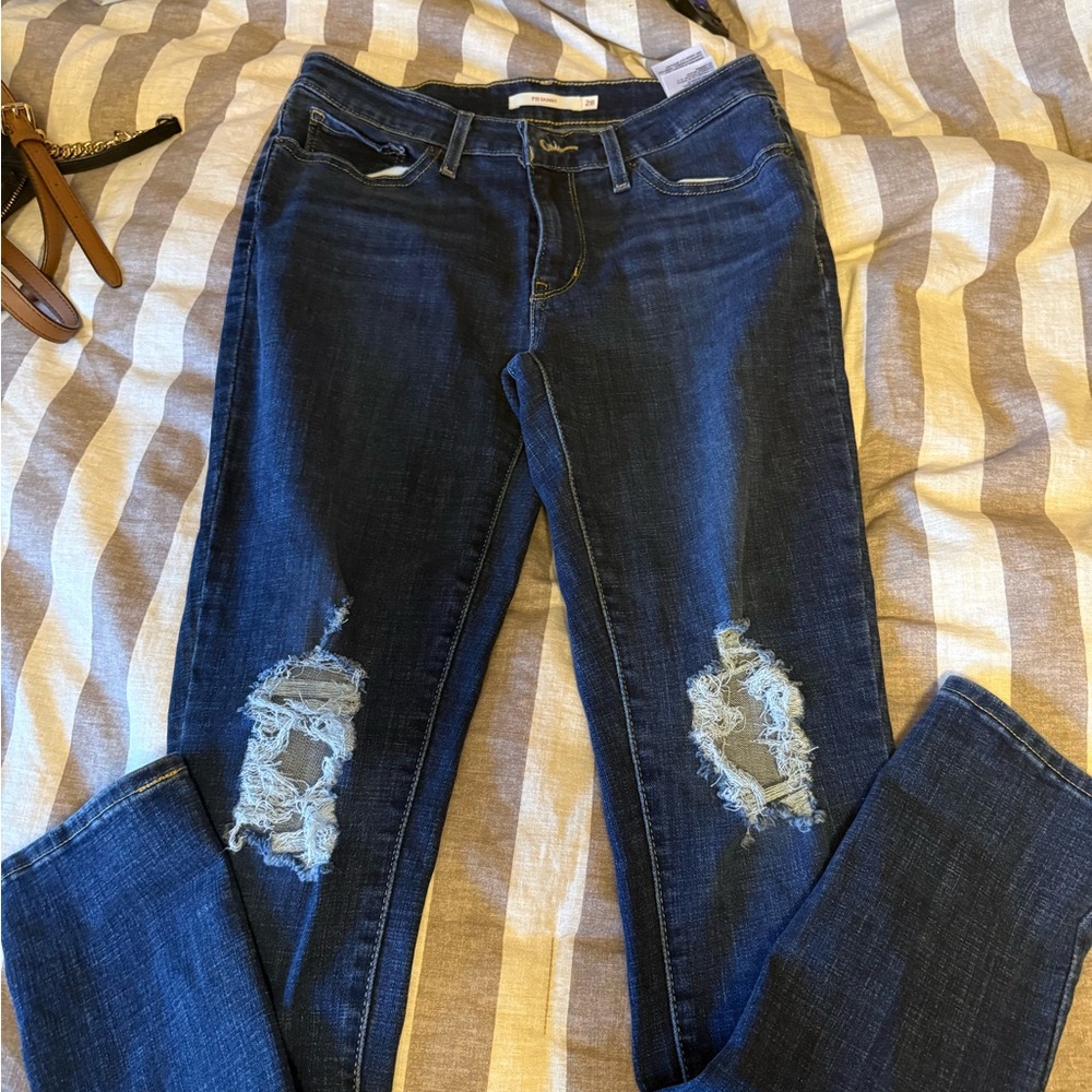 Levi's Dark Blue Distressed Skinny Jeans with Knee Rips